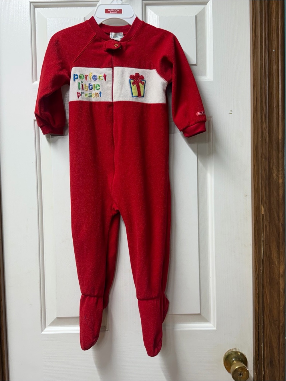The children place Red Holiday Footed One-Piece with Perfect Little Present 3T